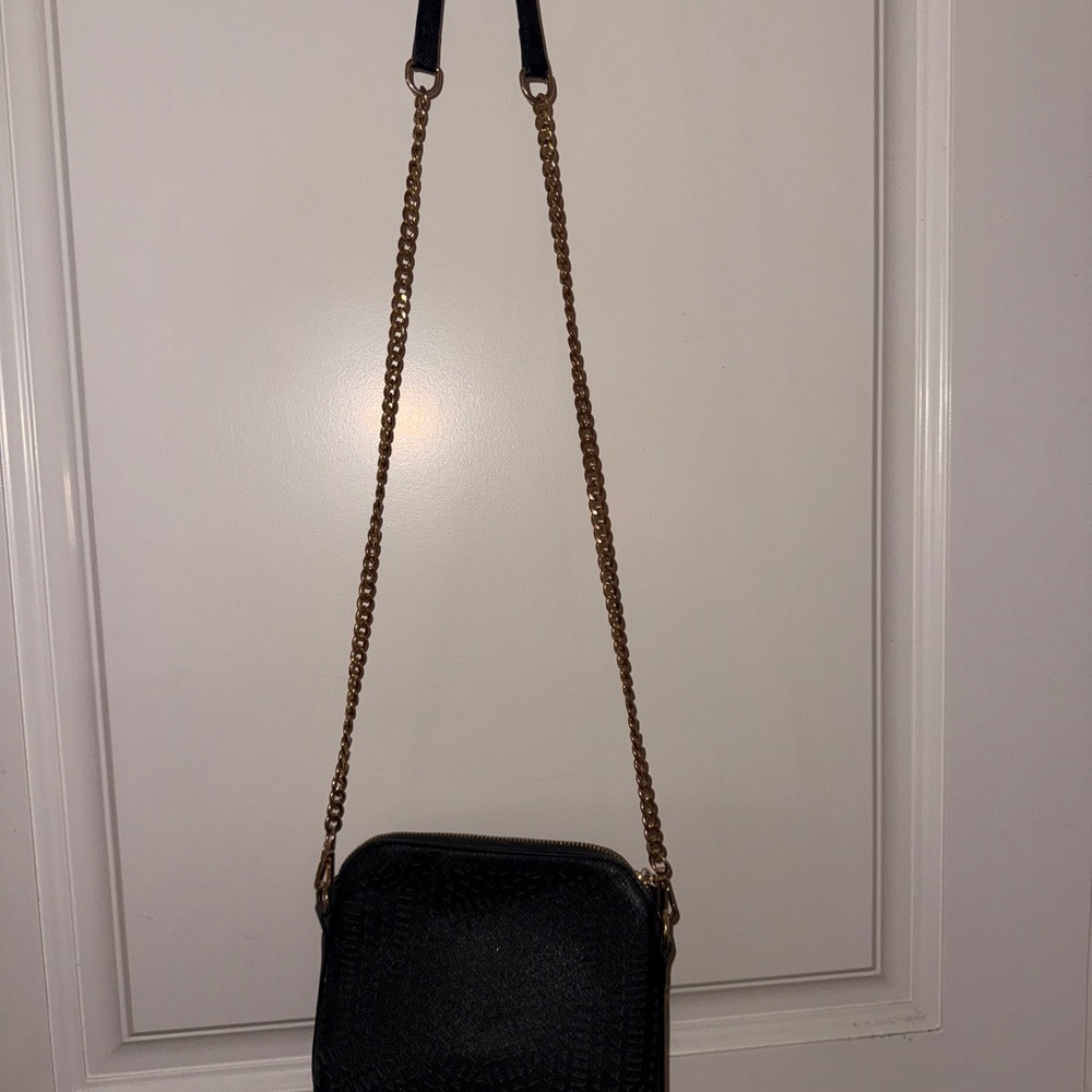 Chic Black and Gold Crossbody Bag with Textured Design